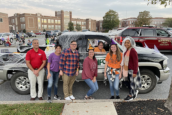 Team members at the annual Halloween parade